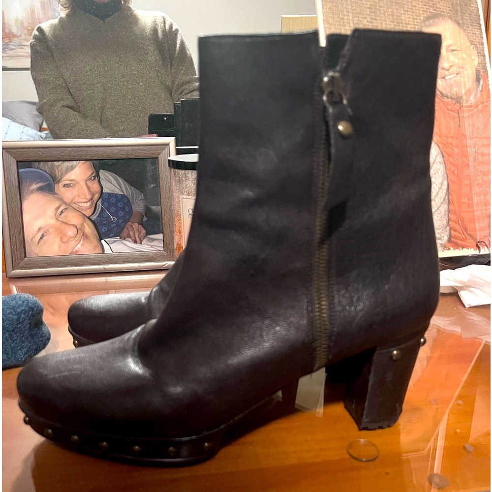 Stuart Weitzman, brown leather with brushed grommets on bottom
